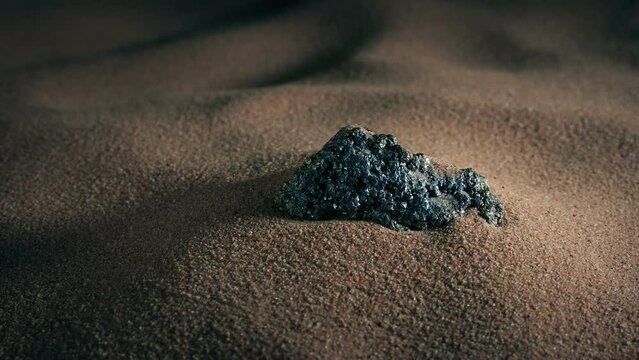 Metallic Rock In The Sand, Mining, Metals Concept