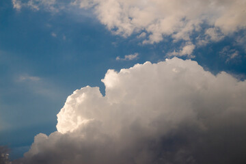 Fototapeta na wymiar Cumulonimbus cloud on blue sky