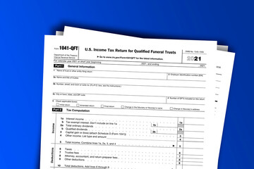 Form 1041-QFT documentation published IRS USA 44207. American tax document on colored