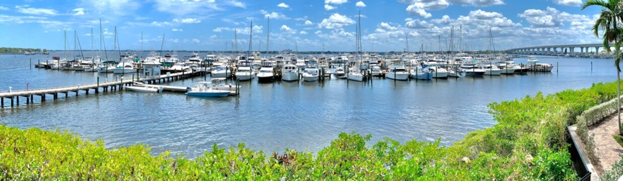 Boats docked at the harbor along the St Lucie intracoastal river in Stuart, Florida, 