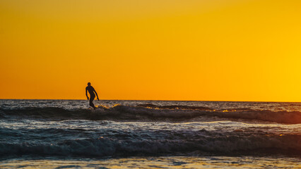 surfer at sunset