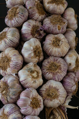 Close up of garlic bulbs with blurred background.