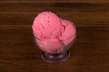 Strawberry Ice Cream Balls served in a glass bowl.