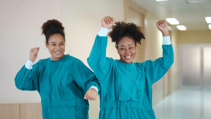 Black group people medical team. Hospital medical staff. Doctor and nurse happy and dancing in hospital