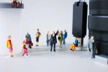 Miniature model of businessman and society.