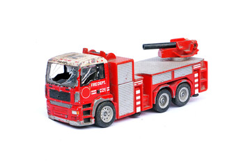 old toy fire engine broken and damaged