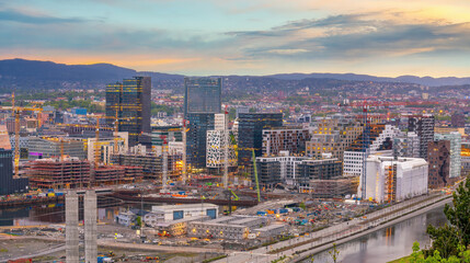  Oslo waterfront downtown city skyline cityscape in Norway at sunset
