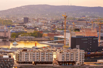  Oslo waterfront downtown city skyline cityscape in Norway at sunset - obrazy, fototapety, plakaty