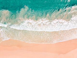 Summer seascape from drone. Tropical beach and sea waves, Turquoise water abstract background from top view. Vacation Travel and idea concept.