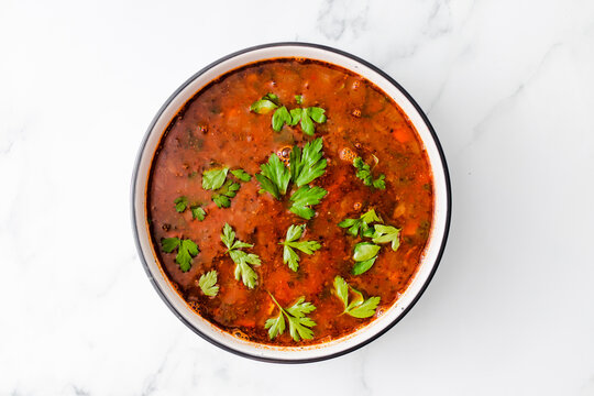 healthy plant-based food, vegan mexican-inspired spicy tomato soup with red kidney beans corn and coriander