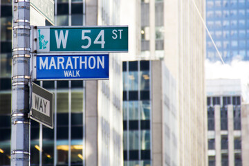 Marathon Walk street sign in New York City, located at the corner of West 54th St. and 6th Avenue...