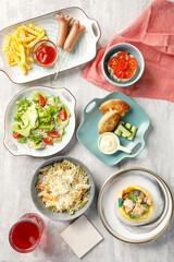 Overhead view of food on light grey concrete background