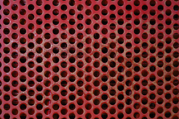 red metal grid circle holes painted iron industrial texture background