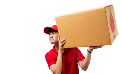 Portrait of young handsome Asian delivery man carrying paper parcel standing on white background.