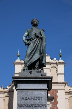 KRAKOW, POLAND - MAY 16, 2022:   closeup of the statue of Adam Mickiewicz on the Adam Mickiewicz Monument in main Square