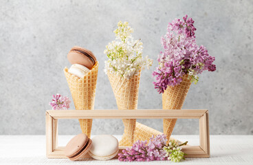Various macaroon cookies in ice cream cones