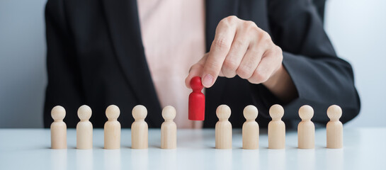 Businesswoman hand pulling leader man wooden from crowd of employees. Toxic People, Human resource...