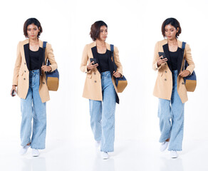 Fototapeta premium Full length of Asian Indian 20s working woman with curl hair hold cell smart phone backpack blazzer