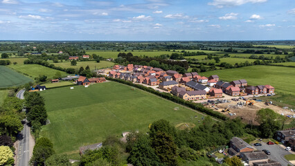 A drone view of the picturesque village of Haughley in Suffolk, UK