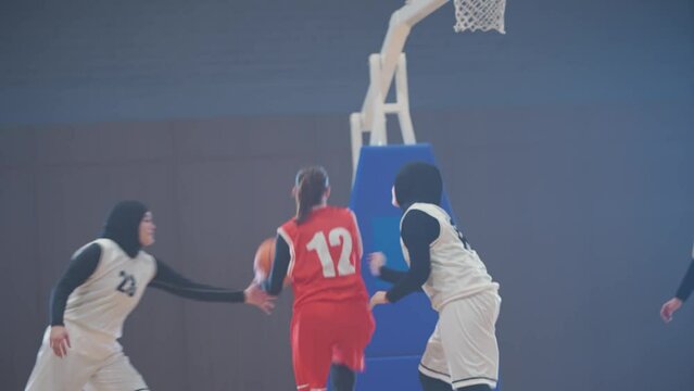 Handheld, sports motivation, women's basketball training game, the confrontation between the European and Arabian teams, 4k slow motion.