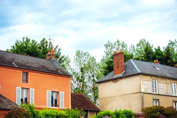 Fototapeta na wymiar Janvry, FRANCE - May 22, 2022: Antique building view in Janvry, France