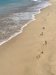 footprints on the beach
