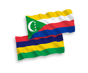 Flags of Union of the Comoros and Republic of Mauritius on a white background