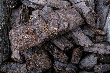 a supply of peat bricks used to light the stove