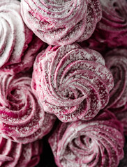Obraz premium Yummy homemade marshmallows. Black currant marshmallows. Homemade sweets. Zefir. Close up. Macro