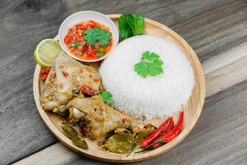 Baked chicken and spicy sauce with rice