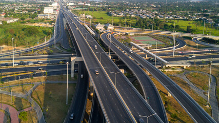 Aerial top view road traffic interchange in city, Aerial view of highway and overpass in city, Expressway top view, Road traffic an important infrastructure, Ecology.