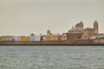 Fototapeta premium The Cathedral of Cadiz from the beach of Santa María del Mar