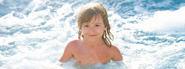 Cute boy swim in pool. Active healthy kids lifestyle, water sport activity and lessons for summer family vacation with child. Banner for header, copy space. Poster for web design.