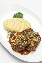 Ossobuco veal shanks with red wine gravy sauce