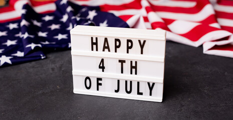 Flapping flag USA with wave. American flag for Memorial Day or 4th of July. Closeup of American...