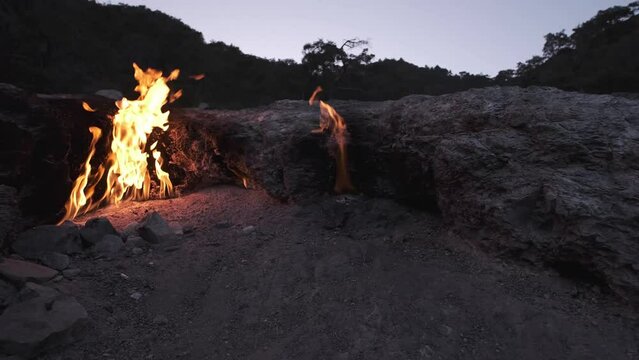 panoramic footage of eternal flame in rocks of famous Mount Chimaera in Antalya, Turkey
