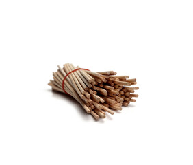 Obraz premium Several pieces of rattan sticks are placed on a white background.