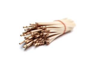 Several pieces of rattan sticks are placed on a white background.