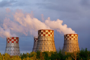 Factory pipes thermal power plants with thick white smoke from heat energy nuclear plant polluting...