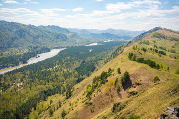 View with mountains, river Katun and valley from top of the rock - damn finger - in the mountainous Altai, Russia 