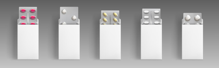 Blisters with medical drugs in open white boxes. Vector realistic mock up of 3d pharmacy package, round and oval pills and tablets in blank carton packs. Template of medicaments wrapping