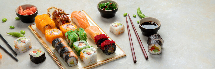 Sushi assortment on light background.