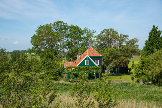 Oterleek, Netherlands, May 2022. Traditional farmhouse with barns in the countryside of western Friesland.