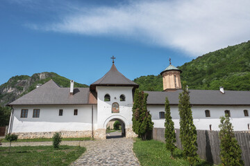 Fototapeta na wymiar Entrance gate to the monastery. Polovragi Monastery in Gorj, Romania.