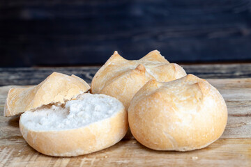 sliced into pieces with a knife fresh soft bun