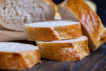 sliced baguette while cooking in the kitchen