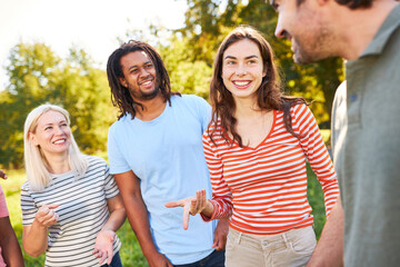 Young people as a clique of friends in the park