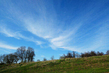 Obraz premium Spring summer Russian landscape. Blue sky with clouds