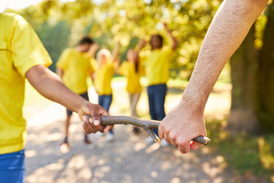 Young People In The Relay Race Pass The Baton