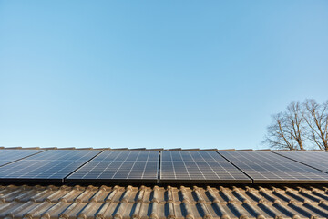 Solar system with solar cells on roof of house for solar energy